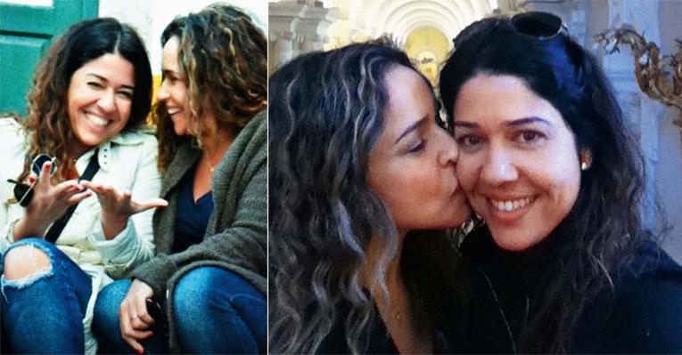 Colocando a paixão em primeiro lugar, Daniela beija a amada, Malu, em passeio na Rússia. O par irradia alegria em Óbidos, Portugal, país onde a baiana assumiu a relação.
